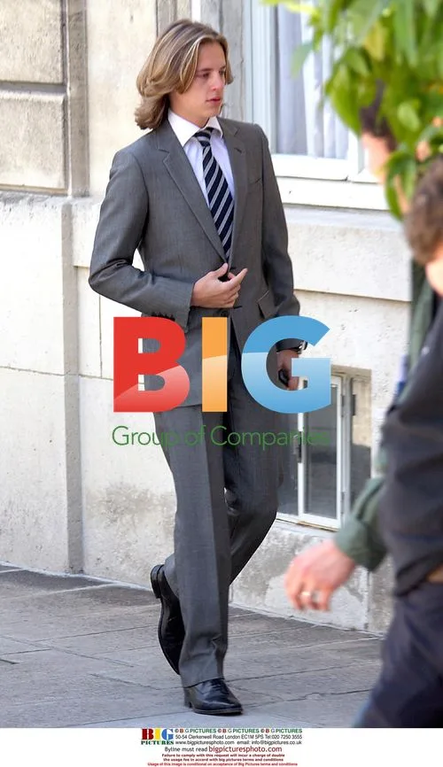 Sarkozy Son Arrives at Bastille Day Garden Party