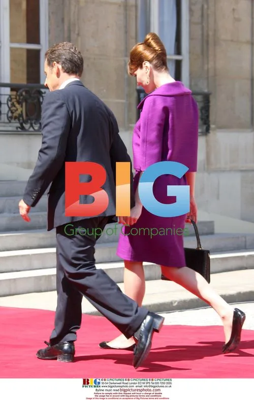 Nicolas Sarkozy and Carla Bruni-Sarkozy Arrive for Bastille Day