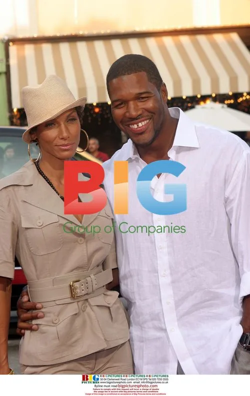 NICOLE MURPHY and MICHAEL STRAHAN at 'Step Brothers' premiere