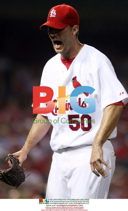 Adam Wainwright reacts after giving up grand slam