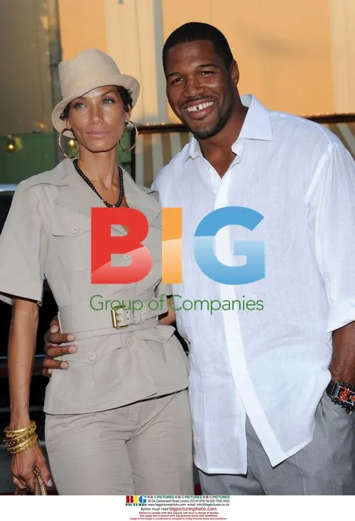 Nicole Mitchell Murphy and Michael Strahan at "Step Brothers" premiere