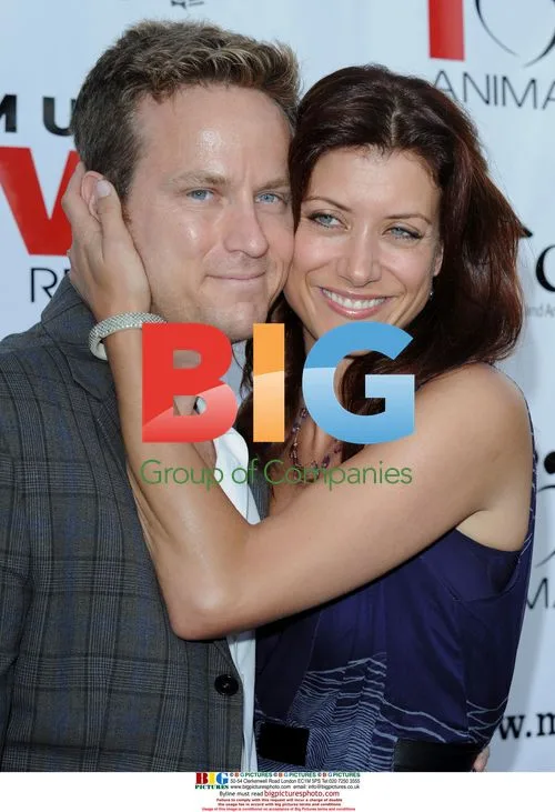 Kate Walsh and husband at Bow Wow Wow event