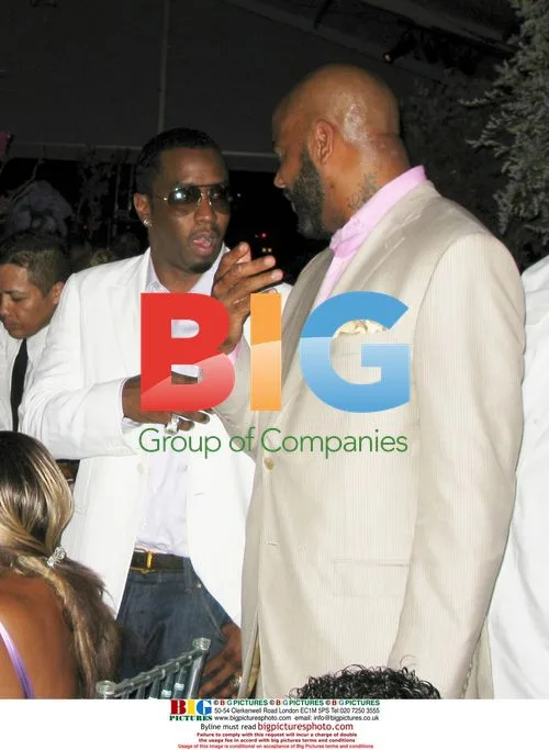 Sean P. Diddy Combs and Ed Lover at Charity Event