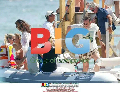 Jean Reno and wife Zofia on dinghy in Saint Tropez