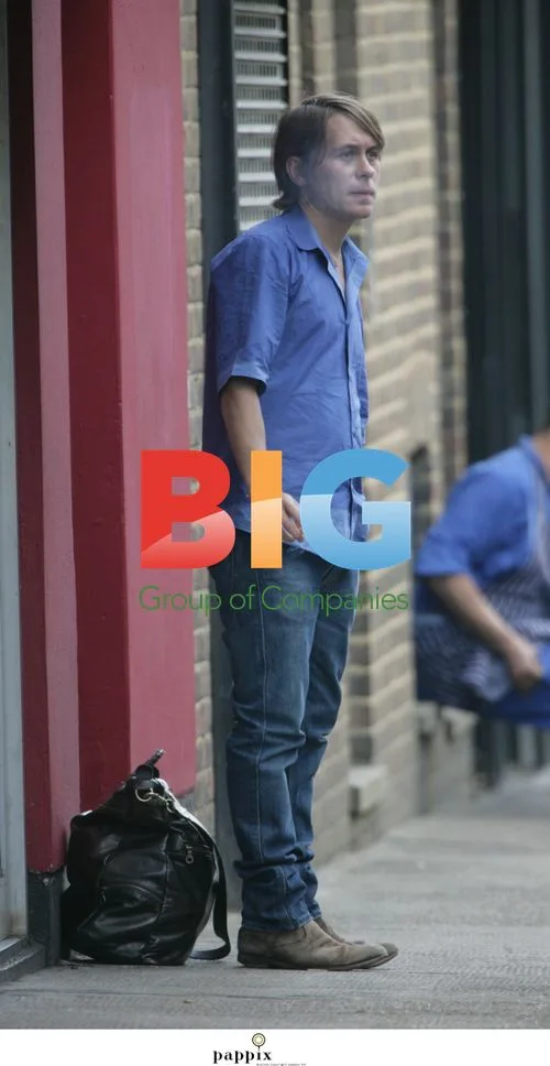 Mark Owen Smokes Outside in London