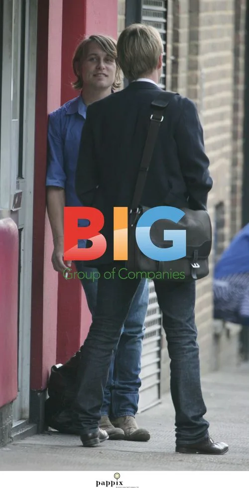 Mark Owen takes cigarette break in London