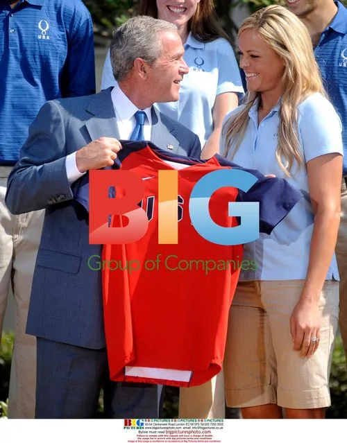 Bush Receives Olympic Softball Jersey
