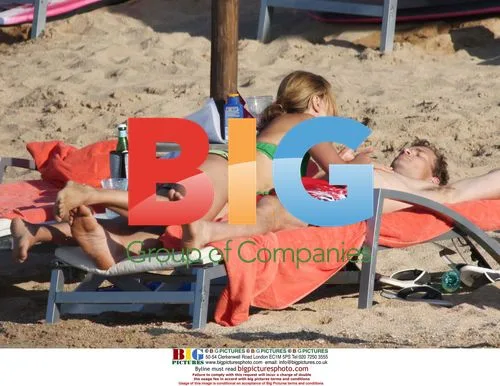 Jens Lehmann on beach with family