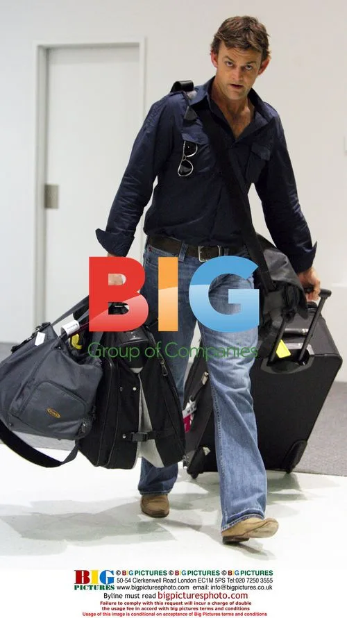Adam Gilchrist and Wife Arrive at Perth Airport