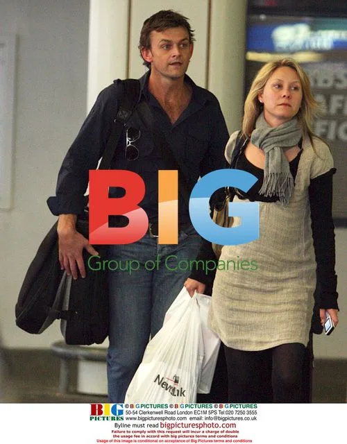 Adam Gilchrist and Wife Arrive at Perth Airport
