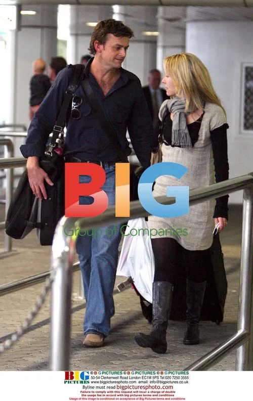 Adam Gilchrist and wife at Perth airport