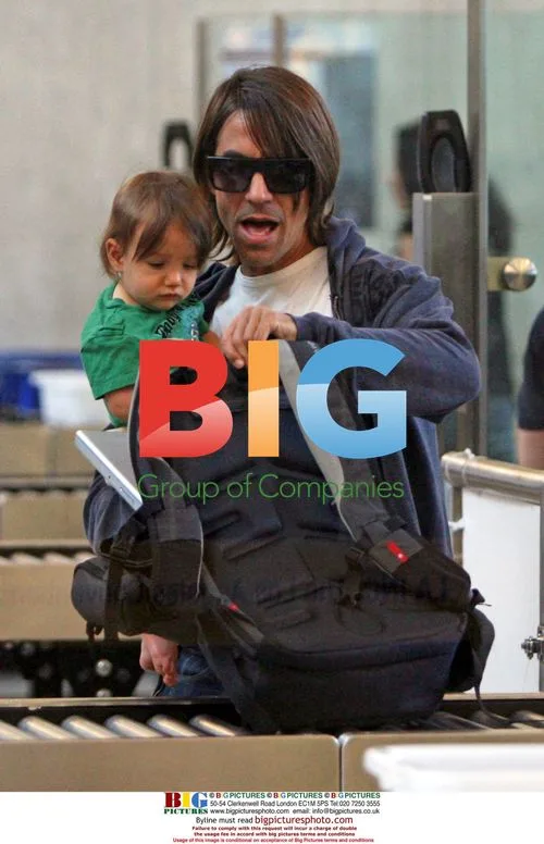 Red Hot Chili Peppers' Anthony Kiedis with son Everly at LAX
