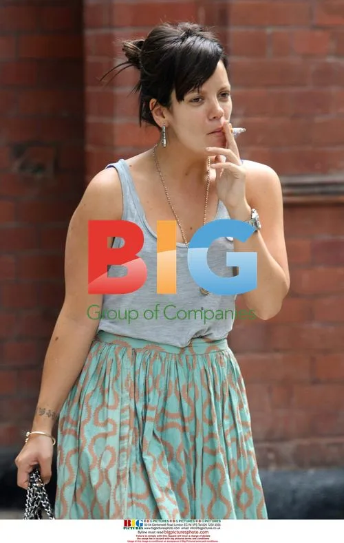 Ed Simons and Lily Allen Depart London