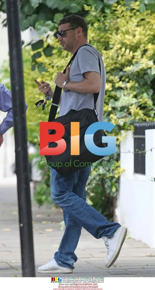 Ed Simons and Lily Allen Depart London