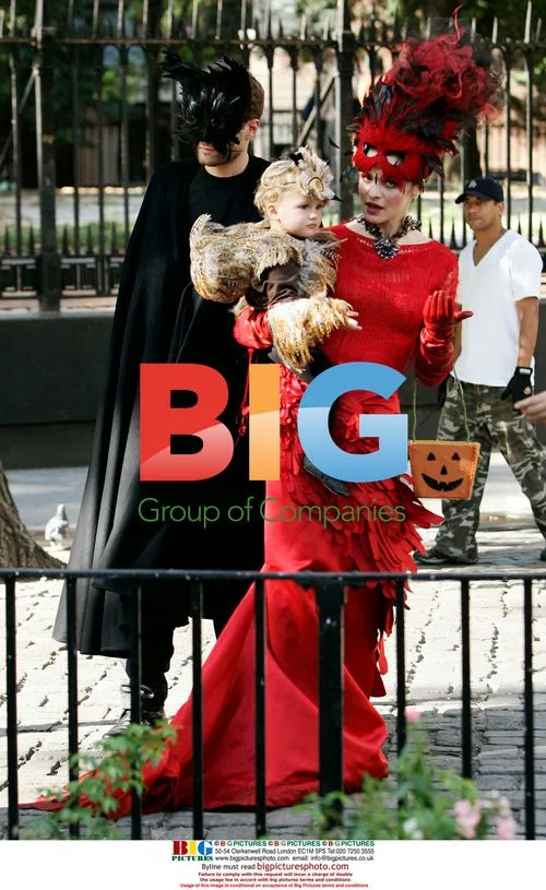 Rachel Weisz in Vibrant Red Costume for Vogue Shoot