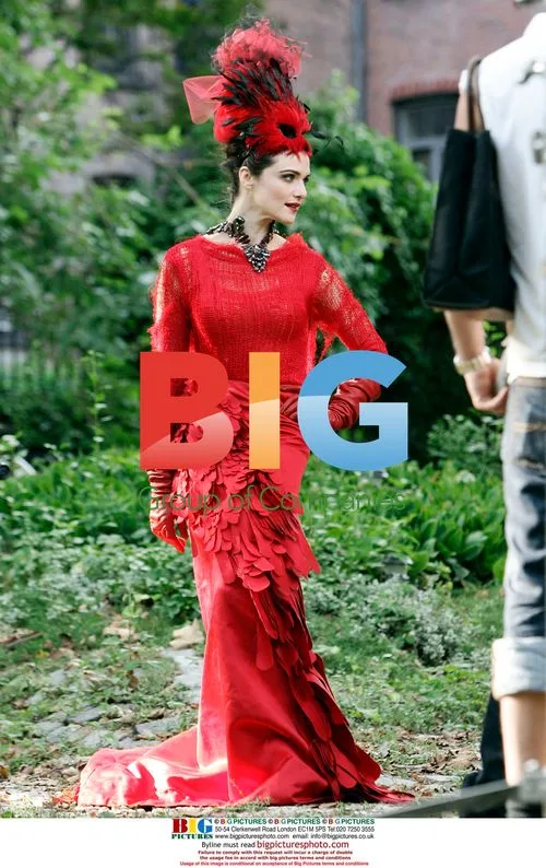 Rachel Weisz in vibrant red costume for Vogue shoot