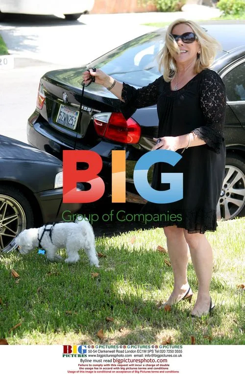 Heather Mills' ex-publicist takes dog for walk