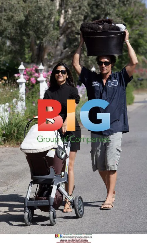 Camilla Alves walks baby Levi outside Malibu home