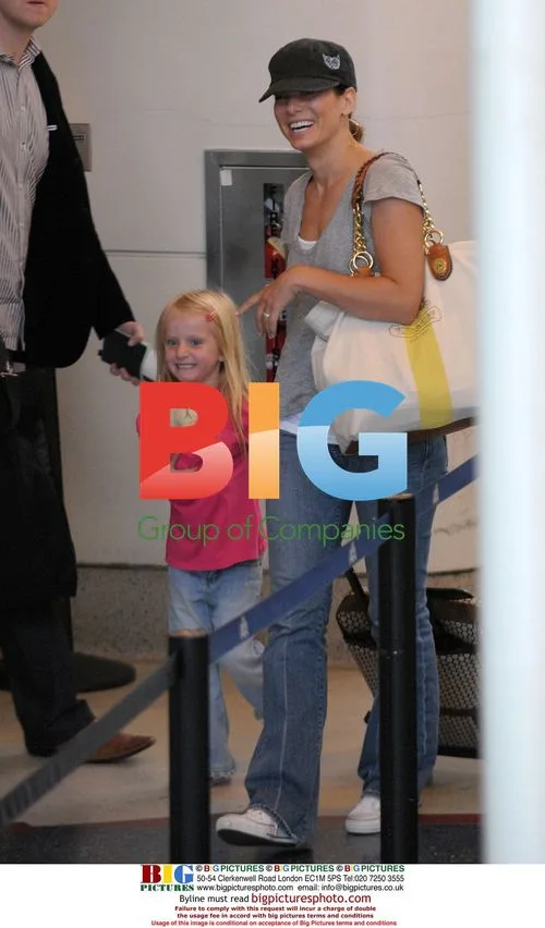 Sandra Bullock and Jesse James at LAX