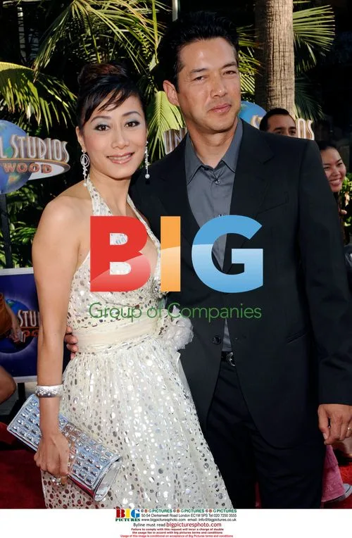 Russell Wong and wife at "The Mummy" premiere