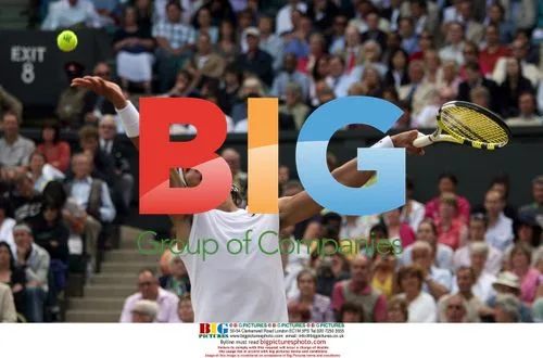 Rafael Nadal serves at Wimbledon semi-final