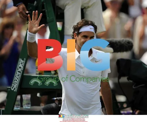 Roger Federer celebrates Wimbledon 4th round win