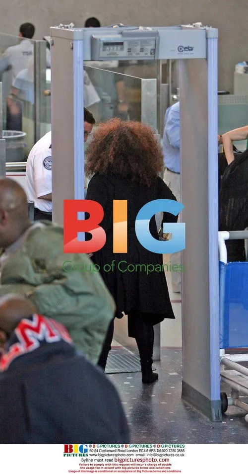 Chaka Khan Departs LAX with Big Hair