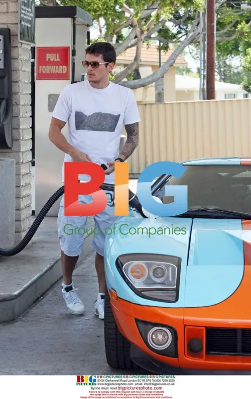 John Mayer drives Ford GT with trainer