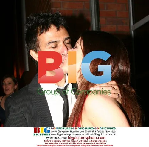 Lucy Evans kissing mystery man at charity event