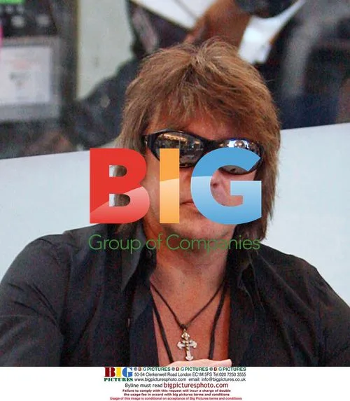 Rocker Richie Sambora in good spirits at LAX