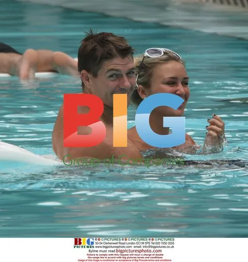 Steve Gerrard and Alex Curran in Miami pool