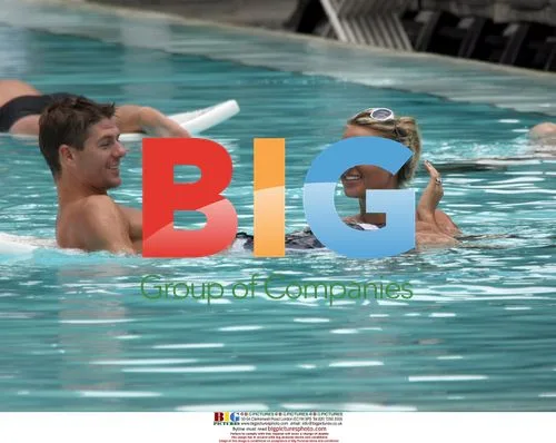 Steve Gerrard and wife Alex Curran in Miami pool