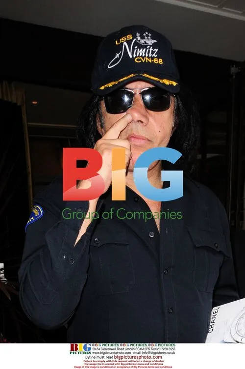 Kiss band members depart London hotel