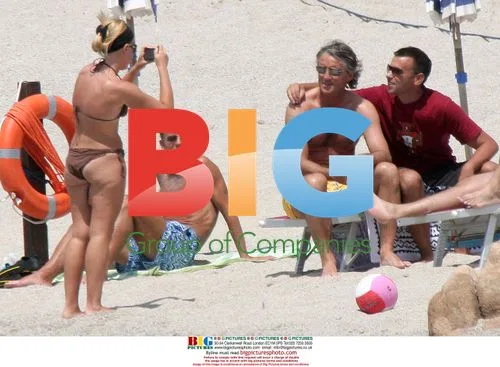 Roberto Mancini on sandy Sardinia beach