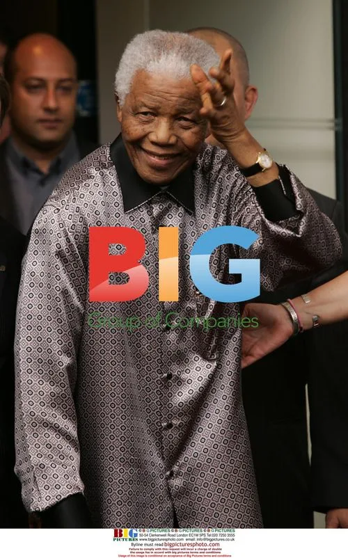 Nelson Mandela Leaves London Hotel After Photoshoot