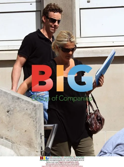 Ulrika Johnson with baby and husband