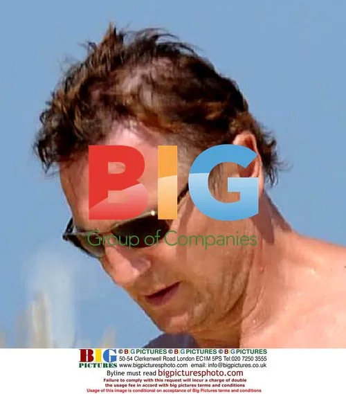Liam Neeson on Saint Tropez Beach
