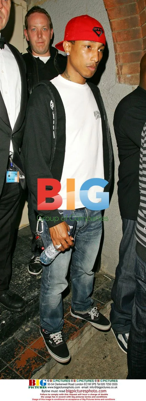 Pharrell Williams leaving Faces nightclub
