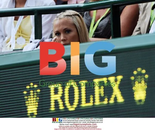 Bec Cartwright watches Lleyton Hewitt's Wimbledon match