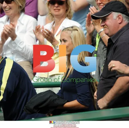 Bec Cartwright watching husband Lleyton Hewitt's Wimbledon win