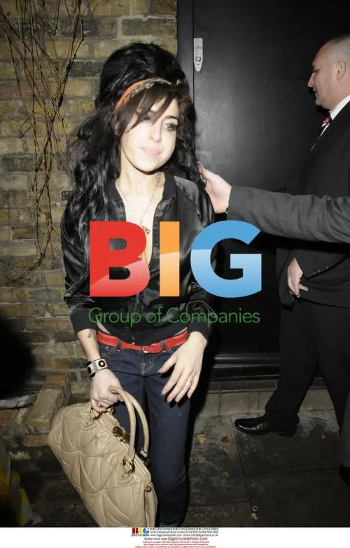 Amy Winehouse Departs for Paris for Fendi Party