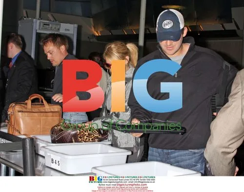 Jessica Simpson and Tony Romo at LAX