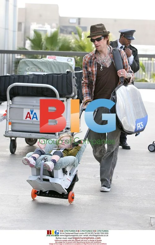 Jane's Addiction Frontman Perry Farrell Departs LAX with Family