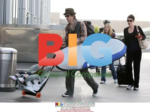 Jane's Addiction's Perry Farrell with family departs LAX