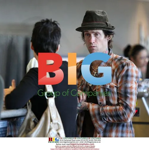 Jane's Addiction's Perry Farrell with family at LAX