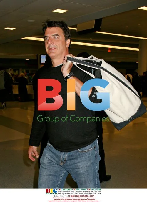 Chris Noth exiting JFK airport terminal