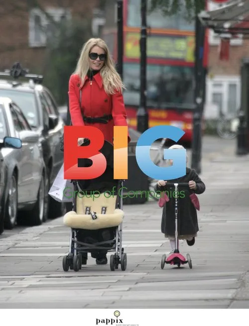 Claudia Schiffer and daughter on scooter