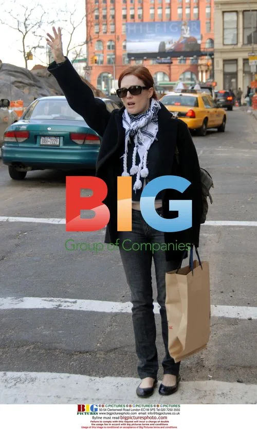 Julianne Moore hails a cab in Soho