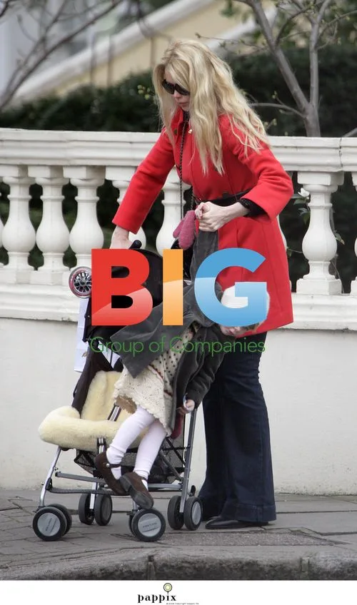 Claudia Schiffer and daughter Clementine on scooter