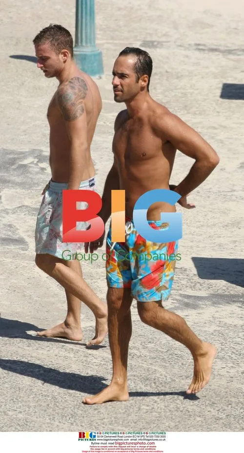 Alex Dimitriadis and friend swim at North Bondi Beach